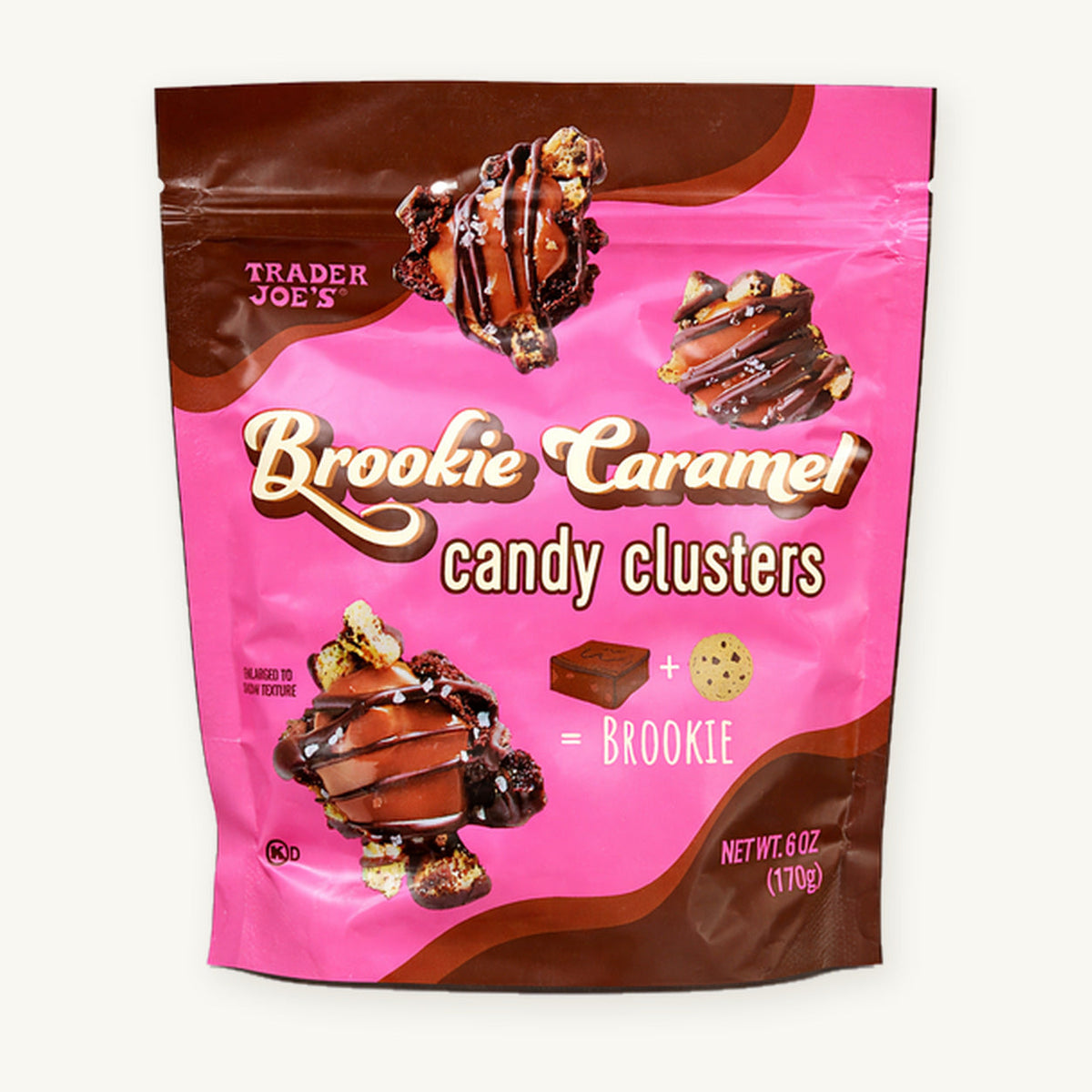 Trader Joe's Brookie Caramel Candy Clusters, 6 oz. Pink and brown pouch on a warm ivory background.